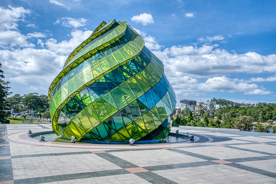 Scene of the glass pavilion artichoke flower bud building located on the Dalat Lam Vien Square Park with Man Nguyen Private Vietnam Tour Packages