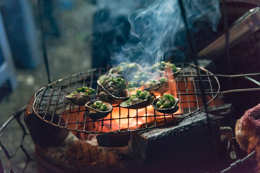 Vietnam Street Food by night with Man Nguyen Private Vietnam Tour Packages