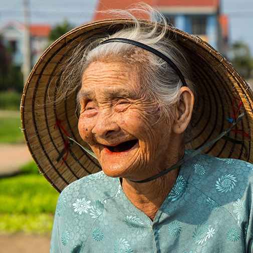 Old Lady Big Smile Tra Que With ManNguyen's Privatevietnamtourpackages